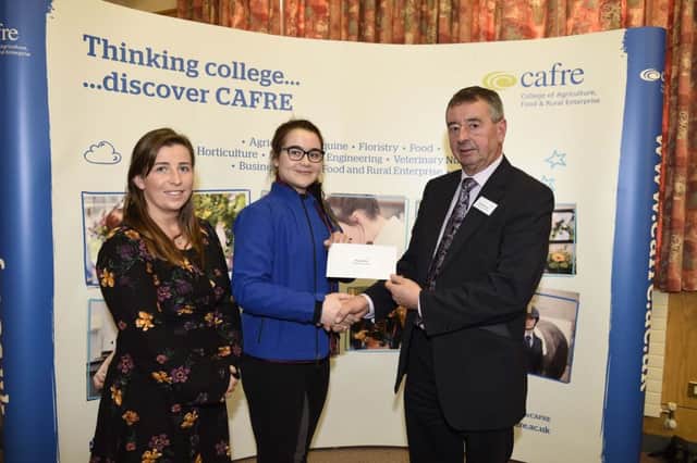 Amy Gordon with Ray Buchanan & Caroline Brindley from Show Jumping Ireland presenting their Bursary Award at Enniskillen Campus Careers Event 2018.