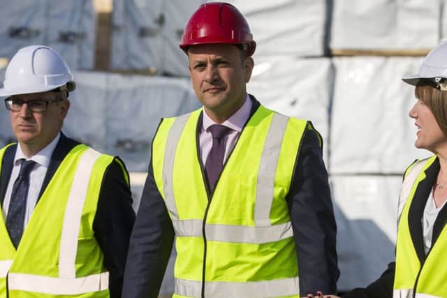 Irish Taoiseach, Leo Varadkar TD, (centre) during a visit to Warrenpoint Harbour in Northern Ireland on Monday April 30. The Irish government have been doing "silly things" in the aftermath of the Brexit vote, says Lord Trimble.    Photo: Liam McBurney/PA Wire