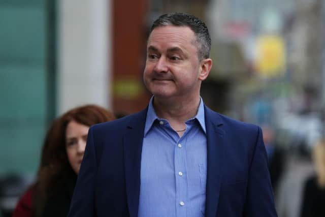 Gay rights activist Gareth Lee arrives at the Royal Courts of Justice in Belfast where the Supreme Court is examining issues linked to the Ashers Baking Company "gay cake" case.