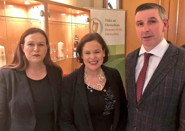 SF president Mary Lou McDonald (centre) with SF TD Louise OReilly and Ian Marshall, after his election to the Irish Seanad