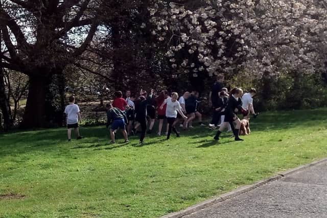 Pupils warming up in the school grounds for the big run
