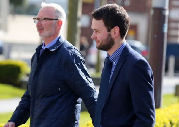 Daniel McArthur with his father Colin, who own Ashers, enter the Royal Courts of Justice in Belfast earlier this week