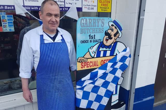 Coleraine butcher Garry Lafferty has decked out his premises in blue and white bunting
