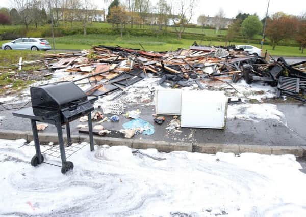 The remains of a bonfire at Milltown in south Belfast which was set on fire overnight on Wednesday