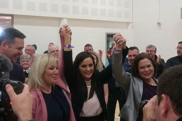 Newly elected Sinn Fein MP Orfhlaith Begley (centre) celebrates with party leaders Michelle O'Neill (left) and Mary Lou McDonald (right)