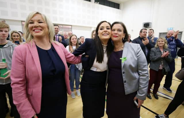 New MP Orfhlaith Begley, Sinn Fein, centre, pictured with Michelle O'Neill, left, and Mary-Lou McDonald at the count centre in Omagh Leisure Centre, Co Tyrone.  Photo by Kelvin Boyes / Press Eye