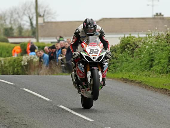 Derek Sheils topped the Superbike qualifying session on the Cookstown/B.E. Racing Suzuki at the Tandragee 100 on Friday.