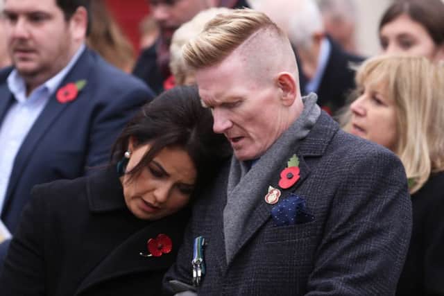 Stephen Gault, who lost his father Samuel Gault in the Enniskillen Poppy Day Bomb, remembers with his wife Sharon during the service at the unveiling and dedication of the memorial for the victims on Wednesday 8 November 2017.

Picture by Press Eye.