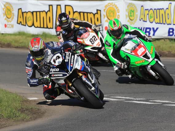 Dan Kneen leads Derek McGee and Derek Sheils on the final lap of the Tandragee 100 Superbike race.