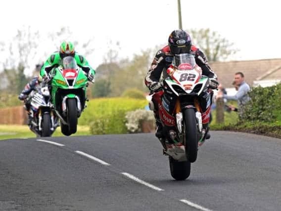 Derek Sheils leads Derek McGee and Dan Kneen in the Open Superbike race at the Tandragee 100.
