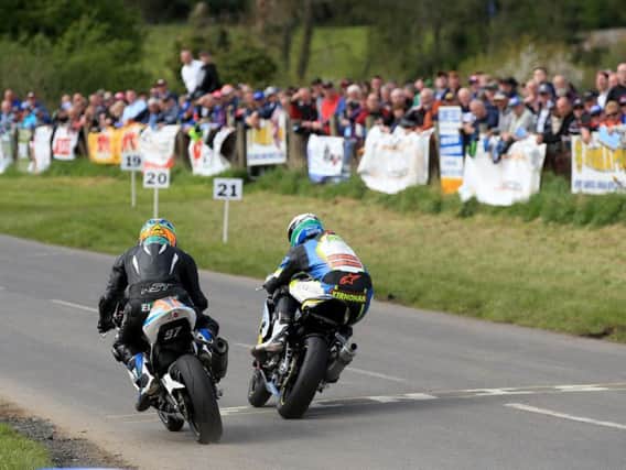 Racing was delayed by more than two hours on Saturday at the Tandragee 100 after a crash involving four riders.
