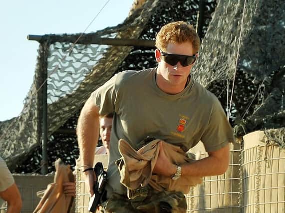 File photo dated 03/11/12 of Prince Harry at Camp Bastion southern Afghanistan,