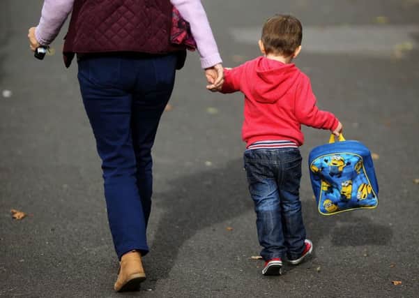 According to a new study by the TUC the number of children growing up in poverty in working households is set to be a million higher than in 2010. Photo: Brian Lawless/PA Wire