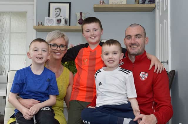 Gerard Doherty pictured at home with his family, wife Edele, five year-old twins Killian and Cian and Lennan (11). DER1818GS042