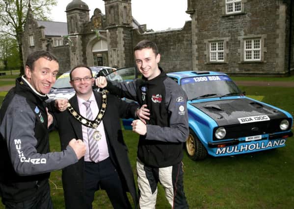 Having some fun in Antrim Castle Gardens are rally drivers, John and Jonny Mulholland with Mayor of Antrim and Newtownabbey, Councillor Paul Hamill. The father and son pair are competing against each other in the rally which will start and finish in Antrim Castle Gardens on 17 & 18 August.