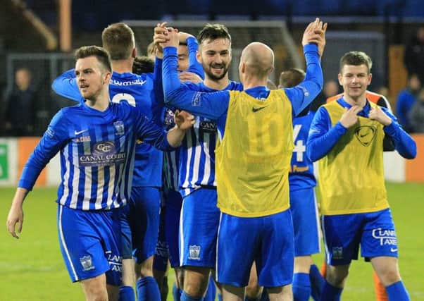 Newry City AFC celebrate reaching the Danske Bank Premiership via success in the promotion/relegation play-off over Carrick Rangers. Pic by Pacemaker.