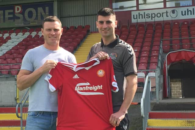 Kevin Braniff and Johnny Flynn celebrate signing for Portadown on two-year deals.