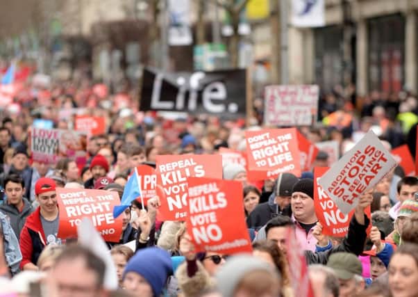 Anti-abortion protesters march through Dublin to campaign for the Eighth Amendment of the constitution to be retained in this summer's referendum. PRESS ASSOCIATION Photo. Picture date: Saturday March 10, 2018. See PA story IRISH Abortion. Photo credit should read: Caroline Quinn/PA Wire