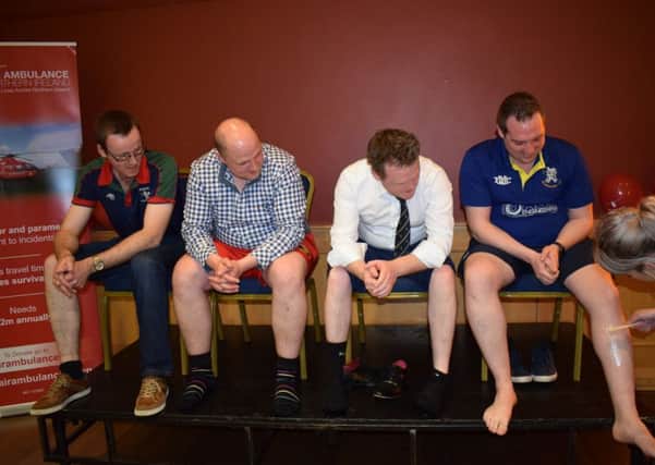 Pictured at the YFCU presidential team charity leg wax are (left to right): William Beattie, YFCU vice president, David Oliver, former YFCU vice president, James Speers, YFCU president, and Peter Alexander, YFCU vice president