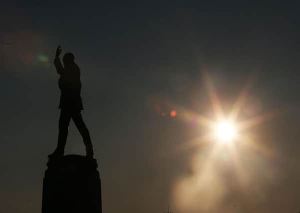 The sun beams down on the statue of Carson, one of Northern Ireland's founding fathers, at Stormont