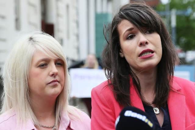 Pro-choice campaigner Sarah Ewart (left), who travelled to England for an abortion after a diagnosis of 'fatal foetal abnormality', and Grainne Teggart of Amnesty International.