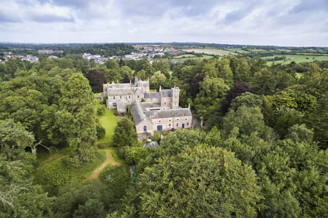 The B1 listed Scottish Baronial-style country house is set among woodland overlooking the River Bann.