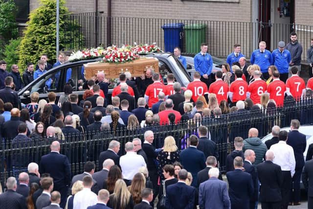 Clubmates from Magheralin Village FC formed a guard of honour for the coffin of Niall OHanlon