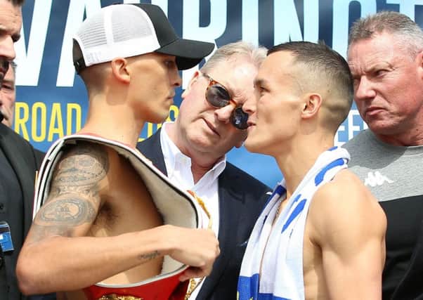 Lee Selby (left) and Josh Warrington during the weigh-in at Leeds Civic Hall.