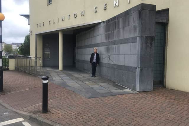 Ruth Blair, whose parents William and Agnes Mullan were killed in the 1987 Enniskillen Poppy Day Bomb, standing at the proposed location for a memorial designed by the families, outside the Clinton Centre.