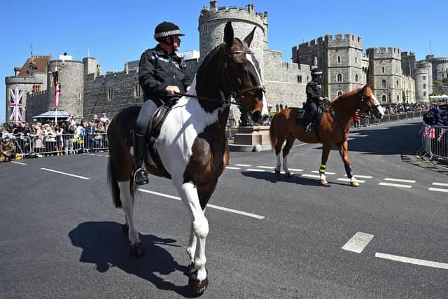 Mounted police before an armed forces parade rehearsal in Windsor, Berkshire ahead of the wedding of Prince Harry and Meghan Markle this weekend