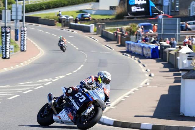 Alastair Seeley pictured on the Tyco BMW Superstock machine at York Corner.