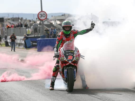 Glenn Irwin celebrates his Superbike double at the North West 200.