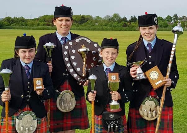 British drum major champions Andrea McKeown Gibson (Adult) and Kathryn McKeown (Juvenile) with Katie Bicker and Carys Graham