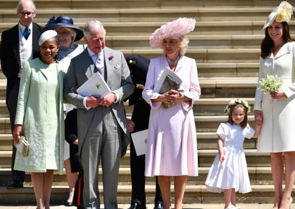 Meghan Markle's mother Doria Ragland, the Prince of Wales, the Duchess of Cornwall, Princess Charlotte and Britain's Catherine, Duchess of Cambridge leave the wedding ceremony of Prince Harry, and Meghan Markle at St George's Chapel, Windsor Castle, in Windsor. PRESS ASSOCIATION Photo. Picture date: Saturday May 19, 2018. See PA story ROYAL Wedding. Photo credit should read: Ben Stansall/PA Wire