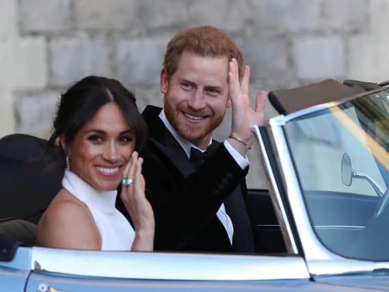 The newly married Duke and Duchess of Sussex, Meghan Markle and Prince Harry, leaving Windsor Castle after their wedding
