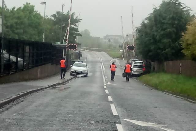 Road closed at Bells Row Lurgan after person is struck by a train