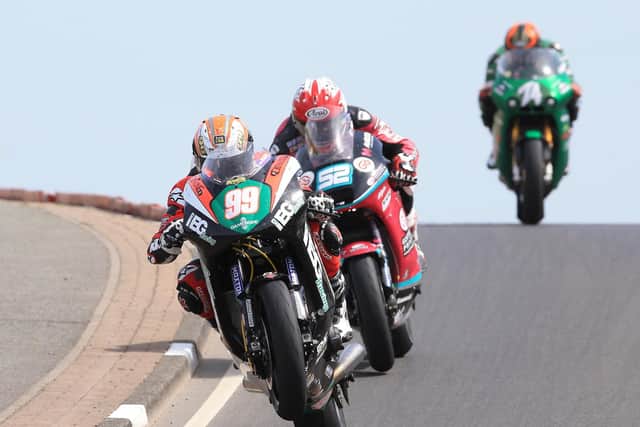 Jeremy McWilliams leads James Cowton and Joey Thompson in the Supertwin race.