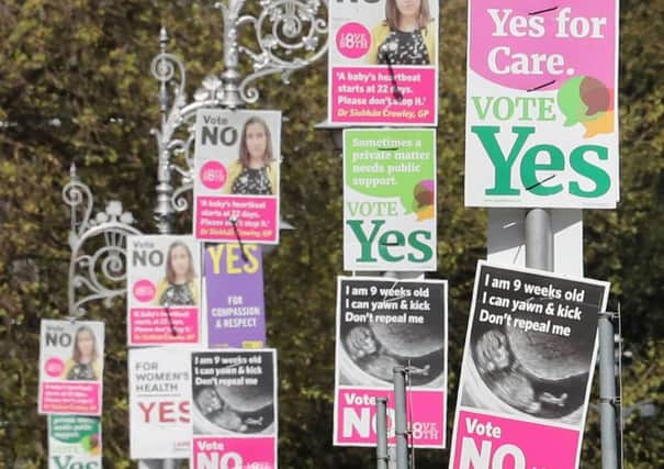 Posters call for Yes and NO votes for a repeal of the Eighth Amendment of the Irish Constitution which was decided on in a referendum on Friday May 25th. Photo: Niall Carson/PA Wire