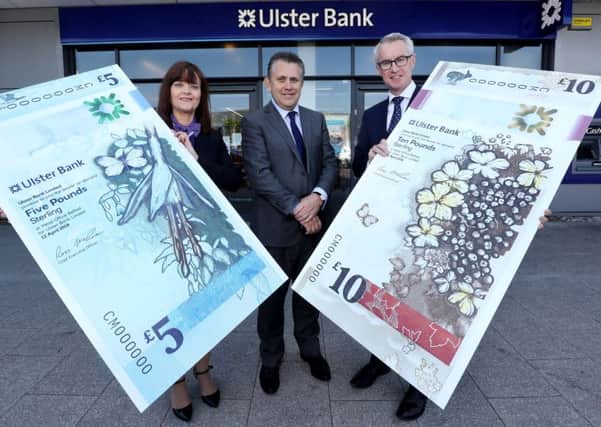 Les Matheson (centre) CEO, Personal Banking at RBS launches Ulster Bank's newly designed bank notes at the bank's Andersonstown Road branch with Collete O'Hare, branch manager and Terry Robb, head of personal banking at Ulster Bank in Northern Ireland.
