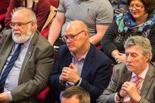 Sinn Fein members (left to right), Francie Molloy, Paul Maskey and Mickey Brady MP, attend Labour leader Jeremy Corbyn's lecture at Queens University in Belfast