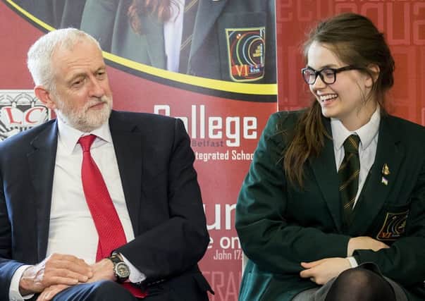 Labour leader Jeremy Corbyn with Lagan College student Madaline Kelly during his visit to the school yesterday