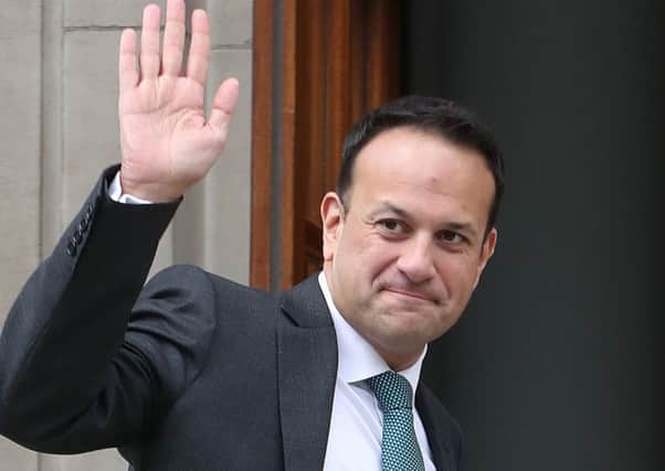 Taoiseach Leo Varadkar waves to the media after meeting the Belgian Prime Minister Charles Michel in Dublin