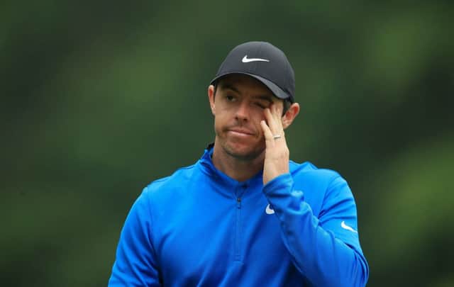 Northern Ireland's Rory McIlroy reacts during day one of the 2018 BMW PGA Championship at Wentworth Golf Club, Surrey. Adam Davy/PA Wire.