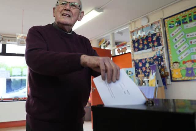 Father McDonagh casts his vote at the polling station in Knock National school, Mayo, as the country goes to the polls to vote in the referendum on the 8th Amendment of the Irish Constitution.