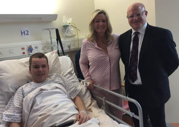 Jo-anne is pictured with her son Mark one day after their transplant, with their Consultant Surgeon Tim Brown