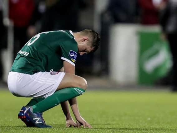 DEFLATED . . . Derry City defender, Eoin Toal.
