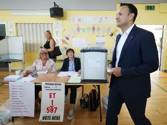 Taoiseach Leo Varadkar leaving Scoil Thomas, Castlenock Dublin, as the Republic of Ireland went to the polls to vote in the referendum on the 8th Amendment of the Irish Constitution.