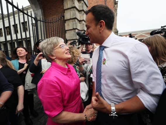 Taoiseach Leo Varadkar greets Minster for Children Katherine Zappone as he arrives at Dublin Castle for the results of the referendum on the 8th Amendment of the Irish Constitution which prohibits abortions unless a mother's life is in danger.