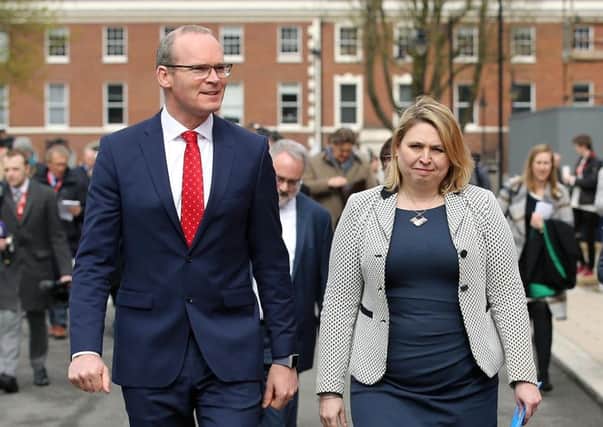 Irish deputy prime minister Simon Coveney at Queen's University Belfast with Secretary of State Karen Bradley MP in April.

London never challenges his pro nationalist interventions, not even after he came close to calling for Tony Taylor to be released. Photo by Kelvin Boyes / Press Eye
