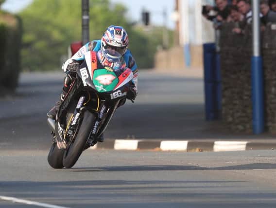 David Johnson on the RST/KMR Kawasaki during Lightweight practice at the Isle of Man TT on Saturday evening.